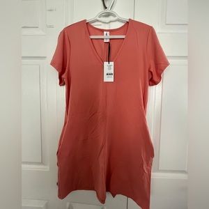 BNWT. Smash & Tess Sunday Shorty dress in Confident Coral.
